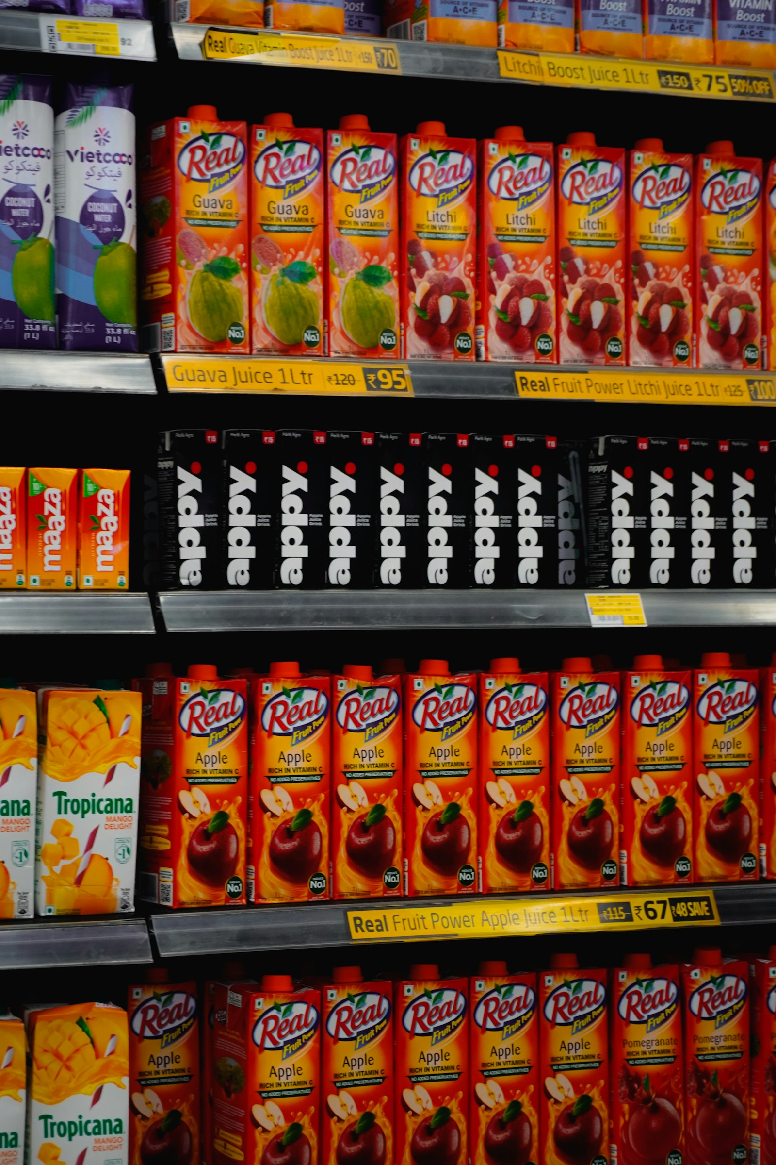 Retail shelf stocked with juice products